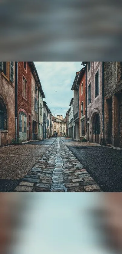 Charming European street with cobblestones and historic buildings.