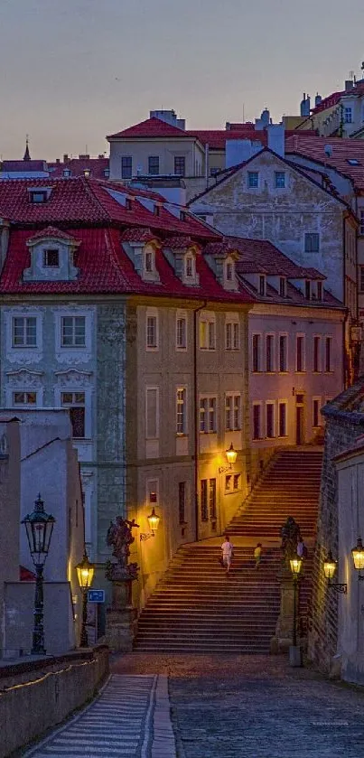 Charming evening view of a historic street with warm lights and architecture.