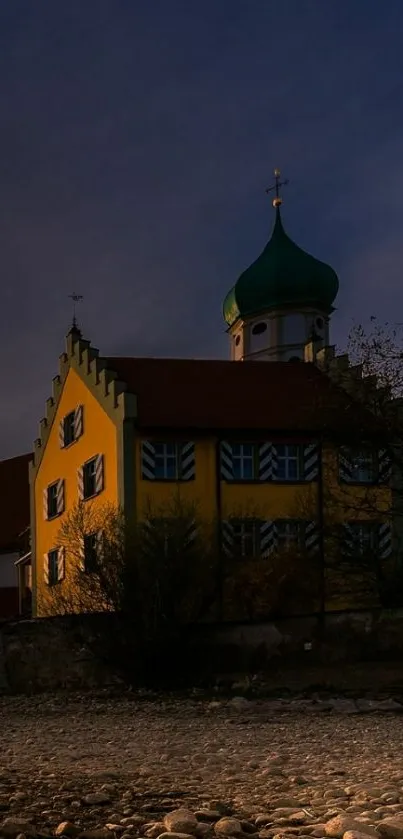 Village house at twilight with evening sky.