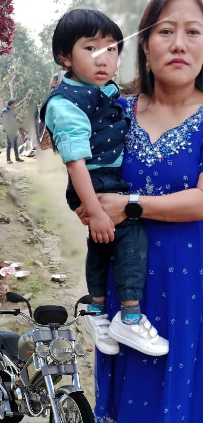 Mother holding child beside a vintage motorcycle outdoors.