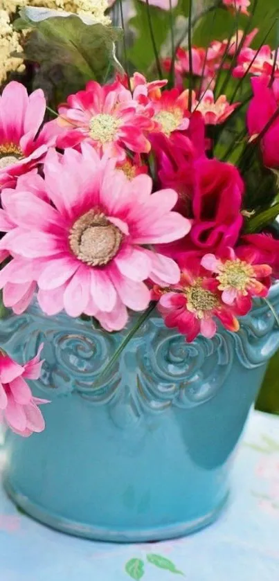 Vibrant flowers in a blue vase wallpaper.