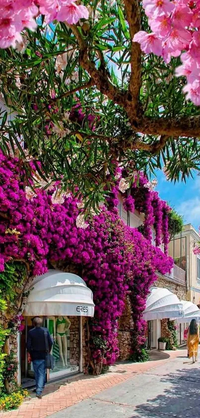 Vibrant street with pink and purple flowers.