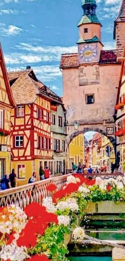 Medieval street with colorful buildings and a clock tower.