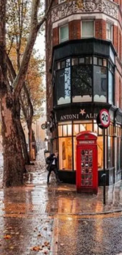 London street scene with red phone booth and autumn leaves.