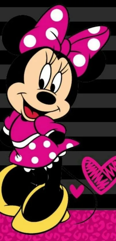 Minnie Mouse in pink polka-dot dress with heart design background.