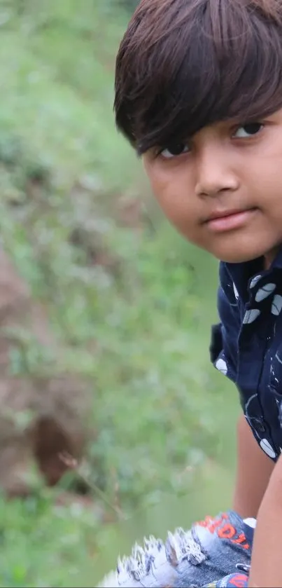 Charming portrait of a child amidst green nature.