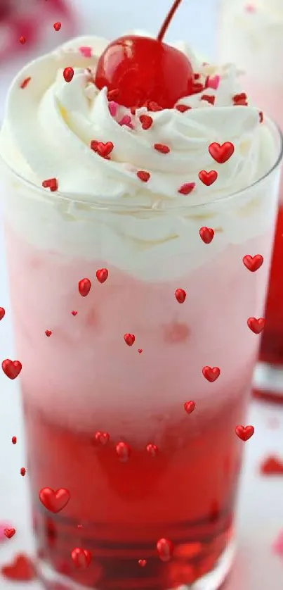 Vibrant pink drink topped with whipped cream and cherry, heart sprinkles scattered.