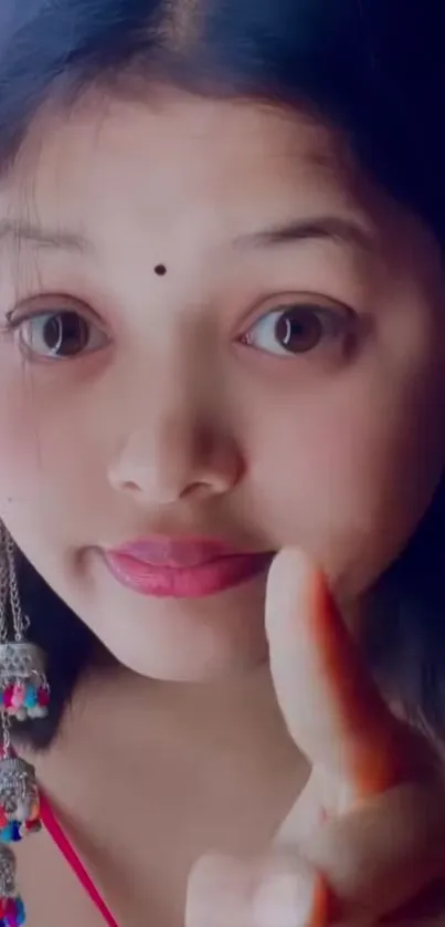 Young woman with decorative earrings portrait