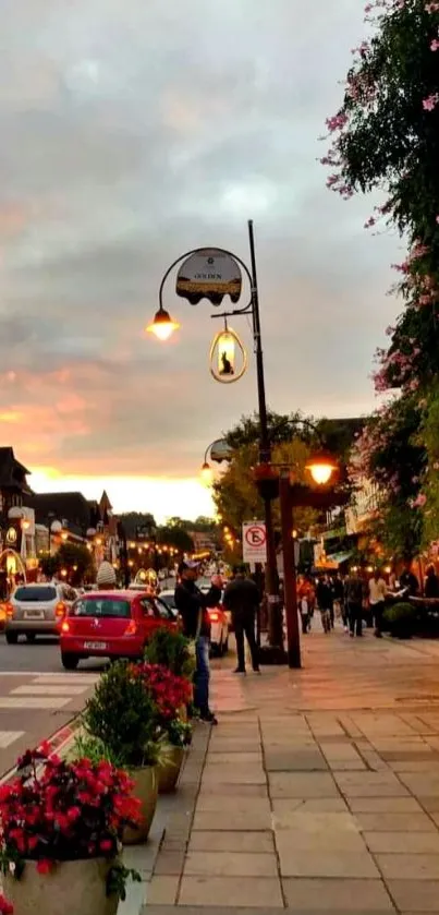 Charming street at sunset with flowers and vintage lamps, perfect for mobile wallpaper.