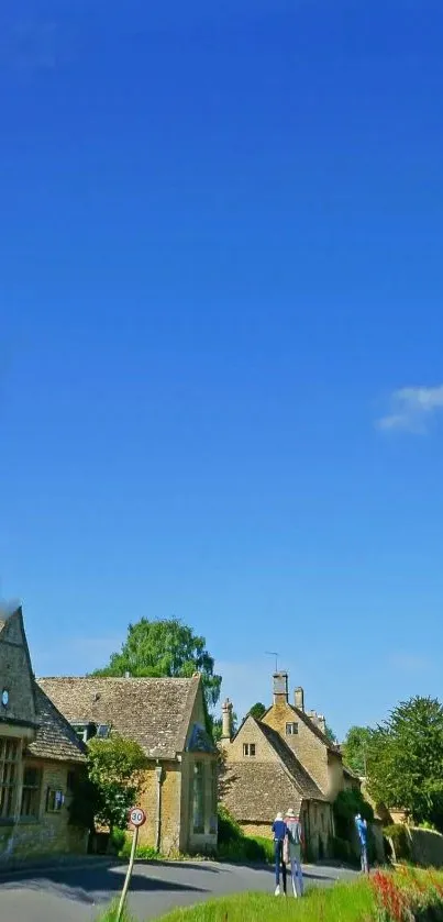 Charming village with rustic houses under a vibrant blue sky.