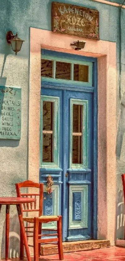 Vintage turquoise café exterior with red chairs and sign.