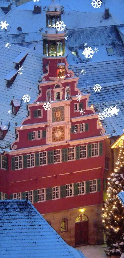 Winter townscape with red building and snow-covered rooftops.