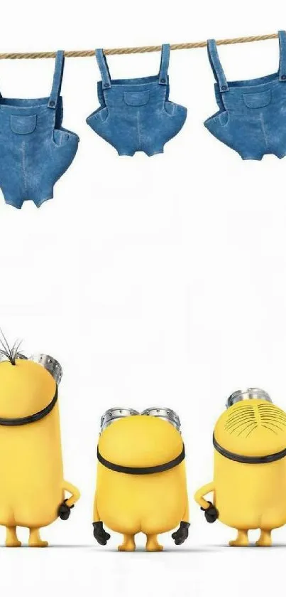 Minions in blue overalls with playful expressions.