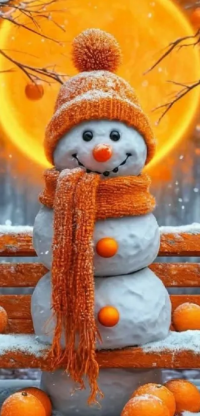 A whimsical snowman with orange hat and scarf on a snowy bench.