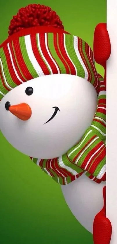 Cheerful snowman peeking against green background in festive colors.