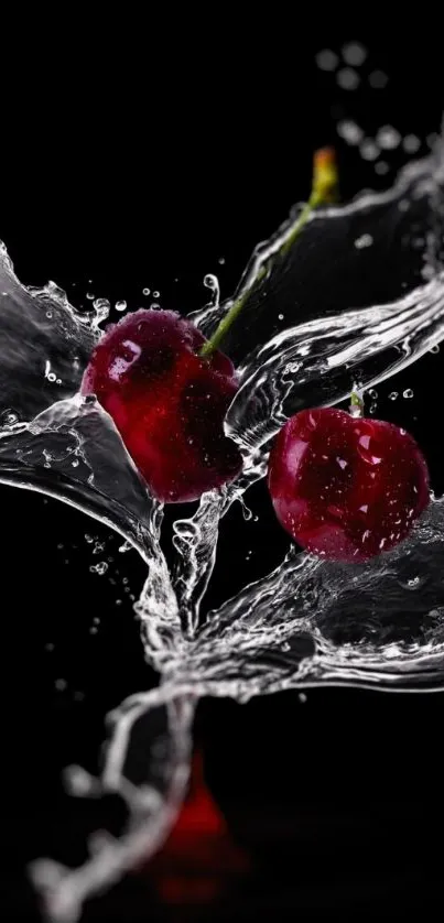 Two cherries splashing in water on a black background wallpaper.