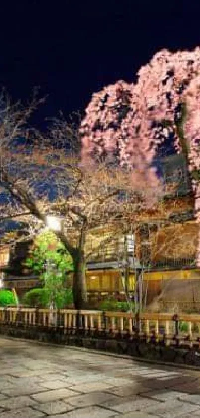 Night view with illuminated cherry blossoms on a city street, vibrant and colorful.