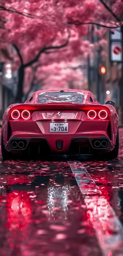 Red sports car drives through cherry blossom street.