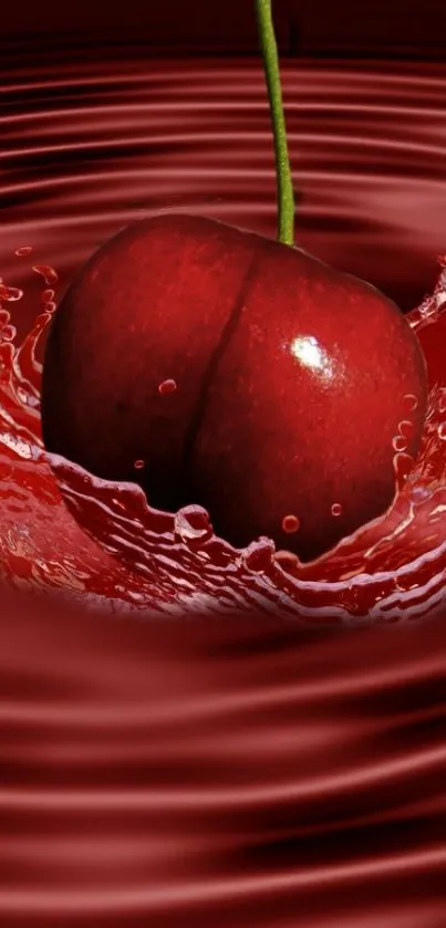 Cherry splash in water with a red backdrop.