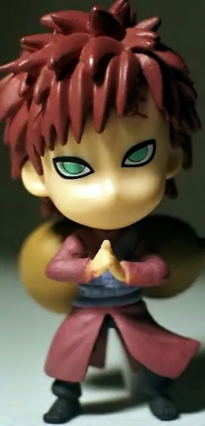 Chibi figure in maroon outfit with detailed eyes.