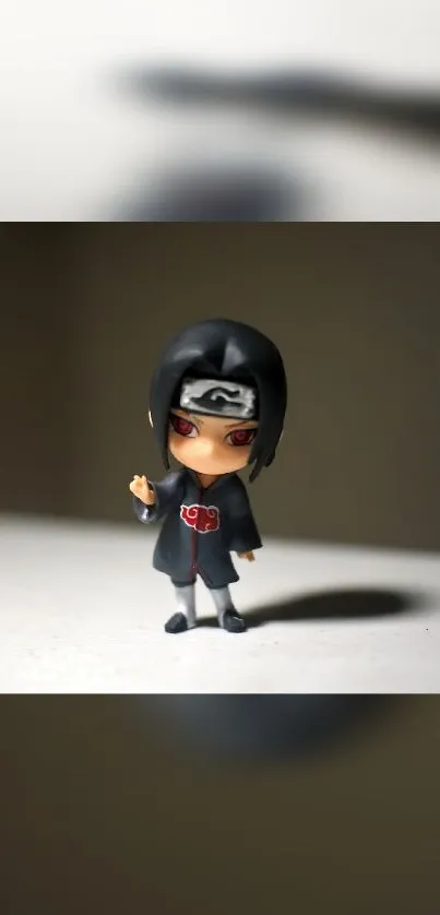 Chibi ninja figure on dark background, perfect for anime-themed wallpaper.