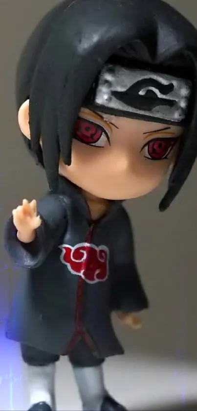 Chibi ninja with red eyes in dark cloak.