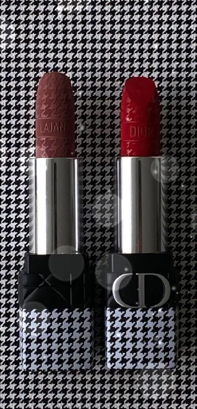 Chic lipsticks on a houndstooth background, exuding elegance and style.