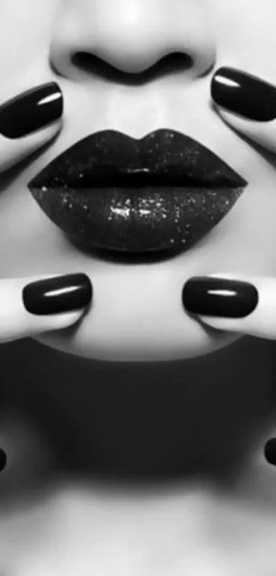 Chic monochrome wallpaper with black lips and nails.