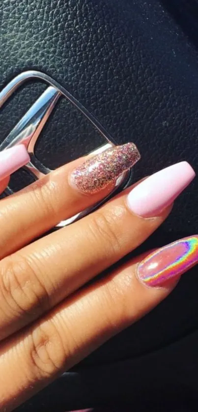 Chic nail art wallpaper with gradient colors and glitter accents.