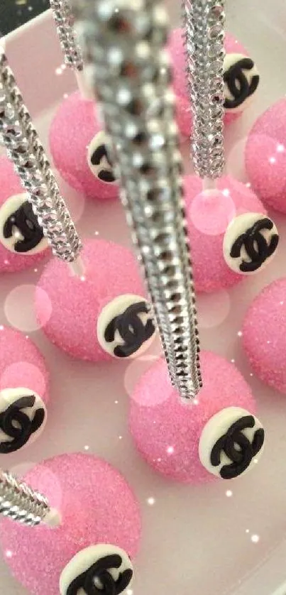 Chic pink cake pops with crystal sticks, perfect mobile wallpaper.