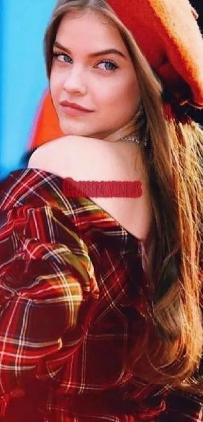 Young woman in red beret and plaid dress with a stylish pose.