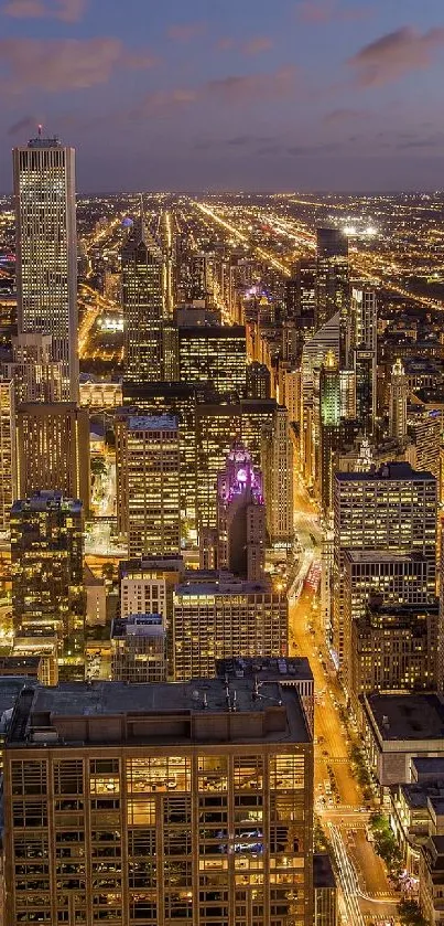 Chicago skyline wallpaper at dusk with illuminated buildings.
