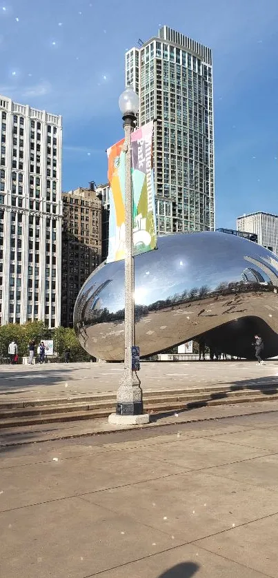 Chicago skyline with Cloud Gate sculpture under a clear blue sky.