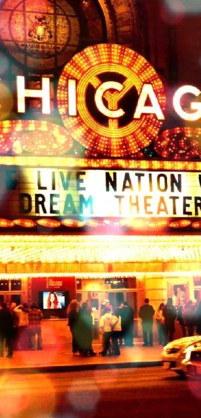 Chicago theater at night with glowing neon lights and vibrant ambiance.