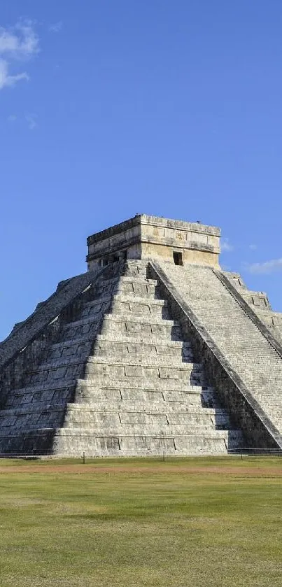 Vivid view of Chichen Itza pyramid under a clear blue sky.