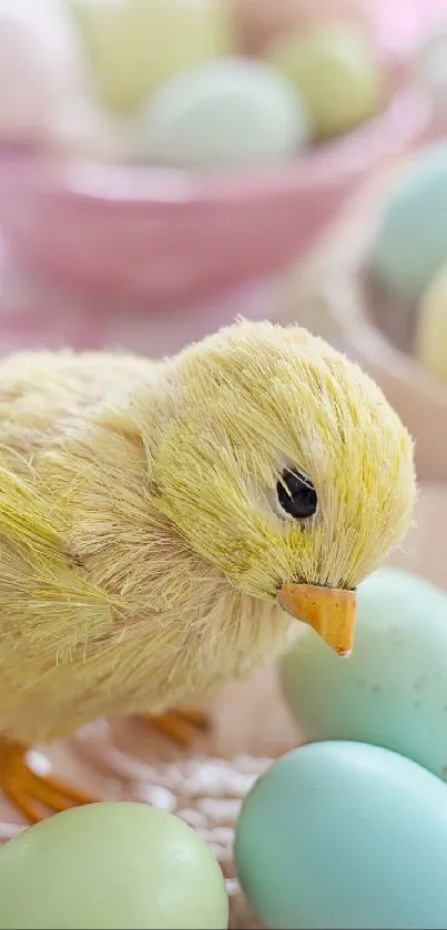 Fluffy chick amidst pastel colored eggs wallpaper.