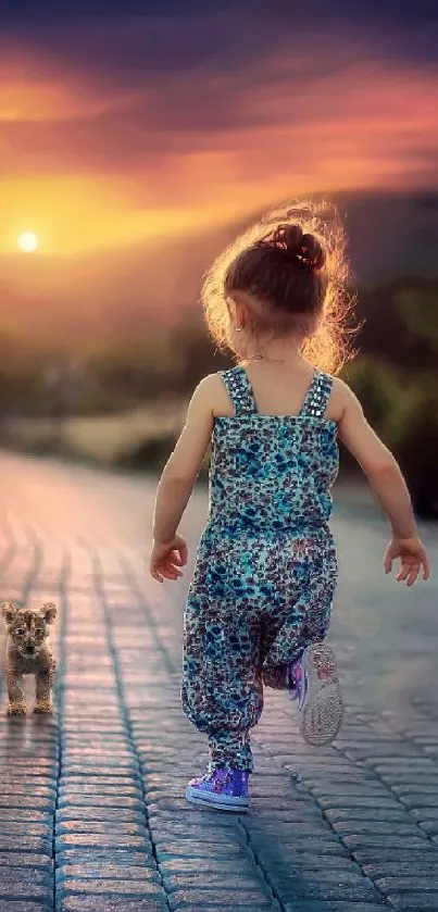 Child and kitten walk on a path at sunset.