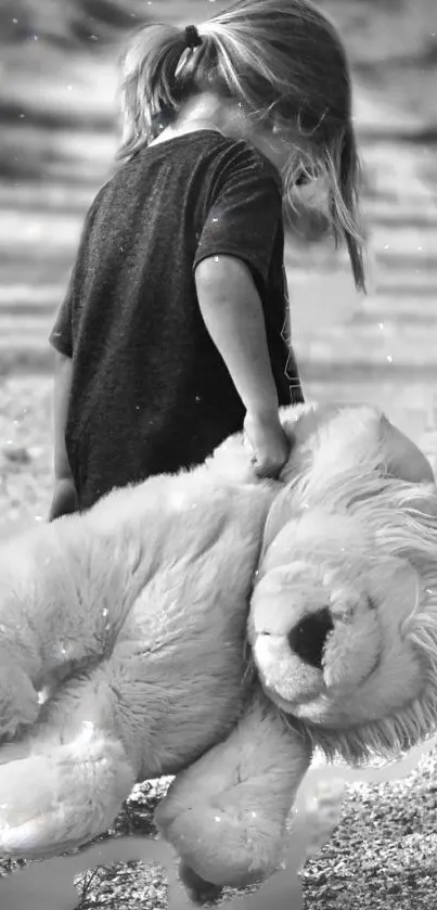 Black-and-white image of a child holding a teddy bear, perfect for mobile wallpaper.