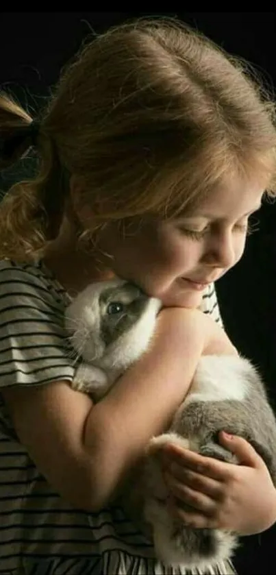 Child lovingly embraces a fluffy bunny.