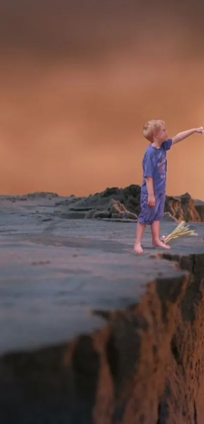 Child standing on rocky cliff edge with warm earthy sky.