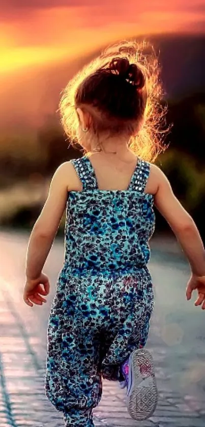 Child walking into a vibrant sunset with glowing hues.