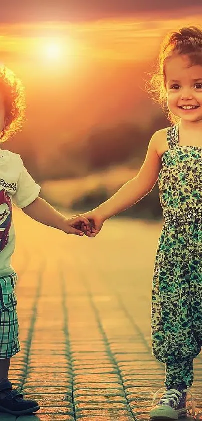 Children holding hands on sunset path, smiling joyfully.