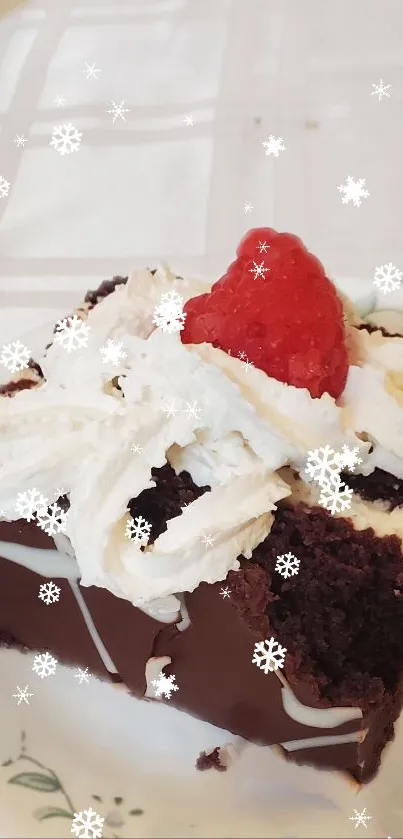 Chocolate cake topped with cream and raspberry on a plate.