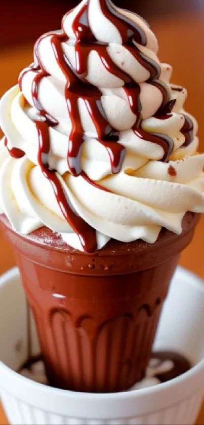 Chocolate cupcake with creamy swirl and drizzle in a white dish.