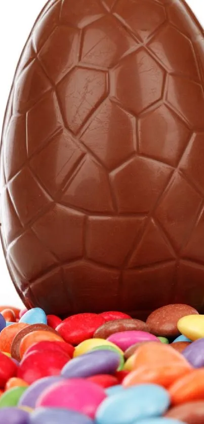 Textured chocolate egg with colorful candies.