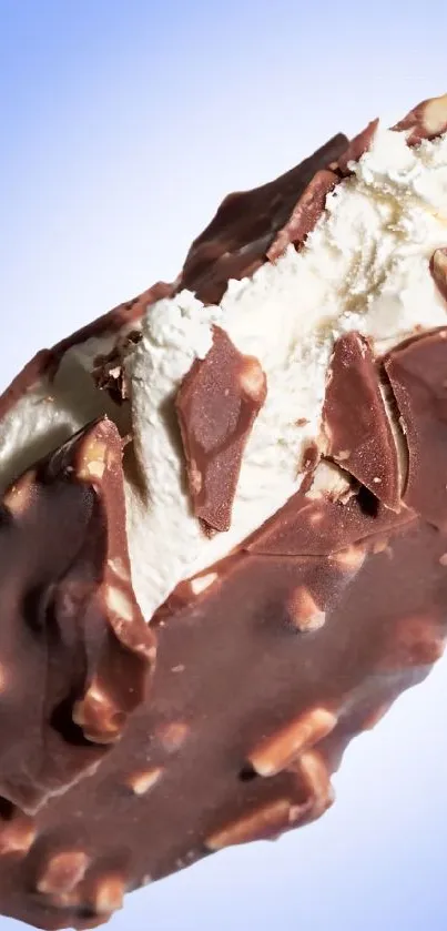 Close-up of chocolate ice cream with a blue backdrop.