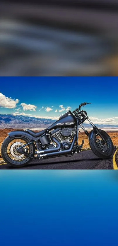 Chopper parked on a scenic desert road with a vivid blue sky backdrop.