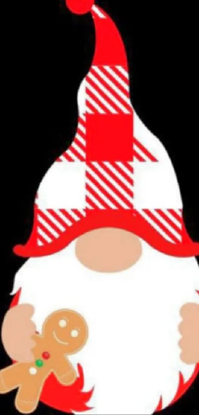 Christmas gnome with gingerbread on a black background.