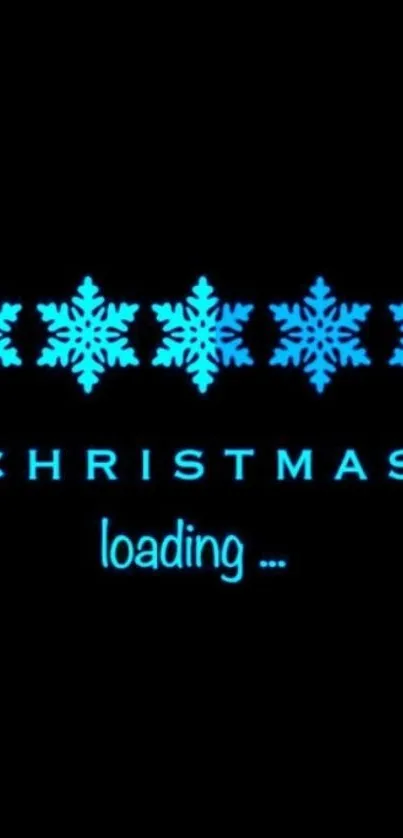 Festive wallpaper with blue snowflakes and Christmas loading text on black background.