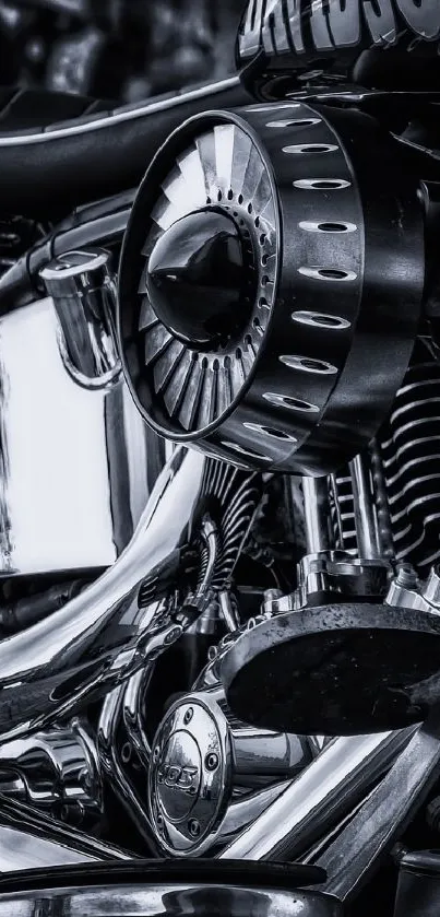 Close-up of a chrome motorcycle engine in artistic black-and-white style.